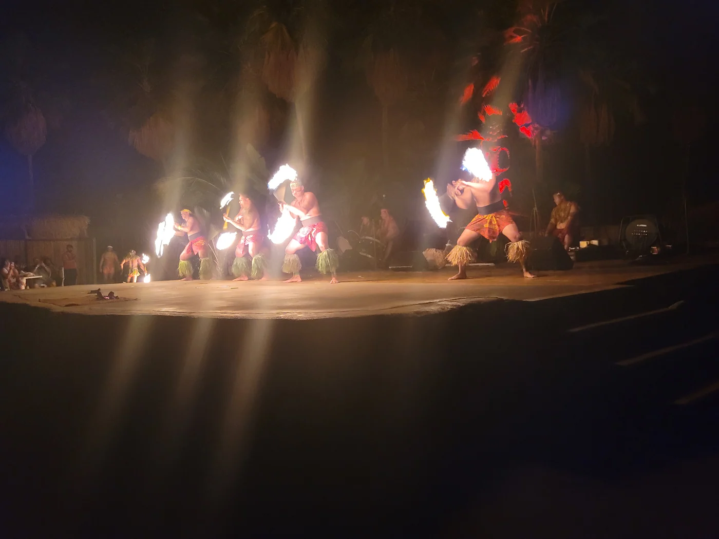 Fire performers at an evening luau on Oahu