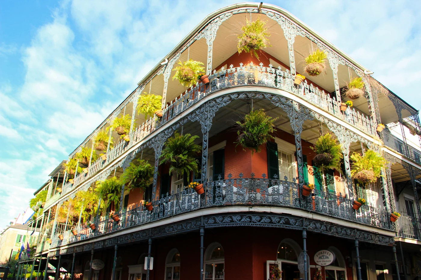 Ornate balconies and hanging plants in the French Quarter of New Orleans