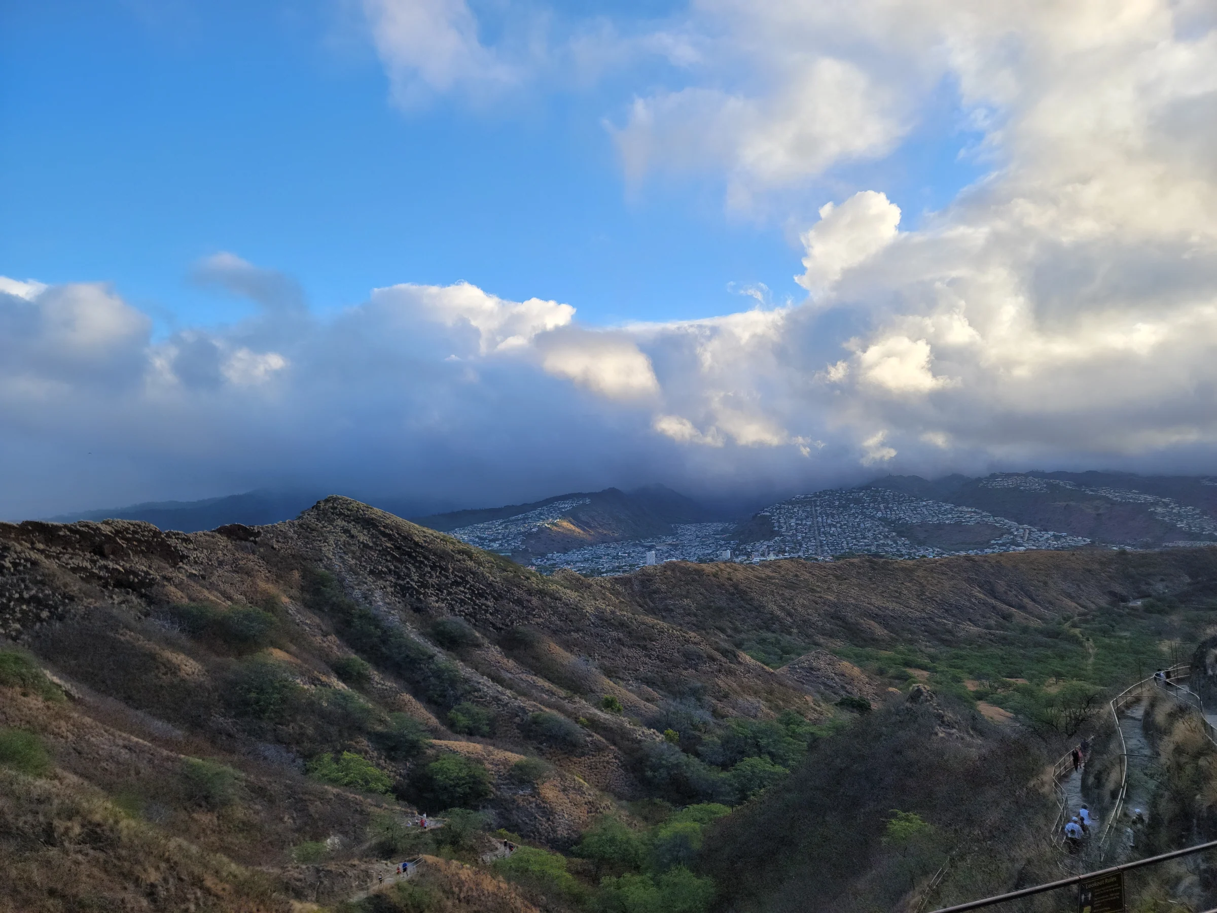 Diamond Head crater and distant Oahu ridges beneath a morning sky