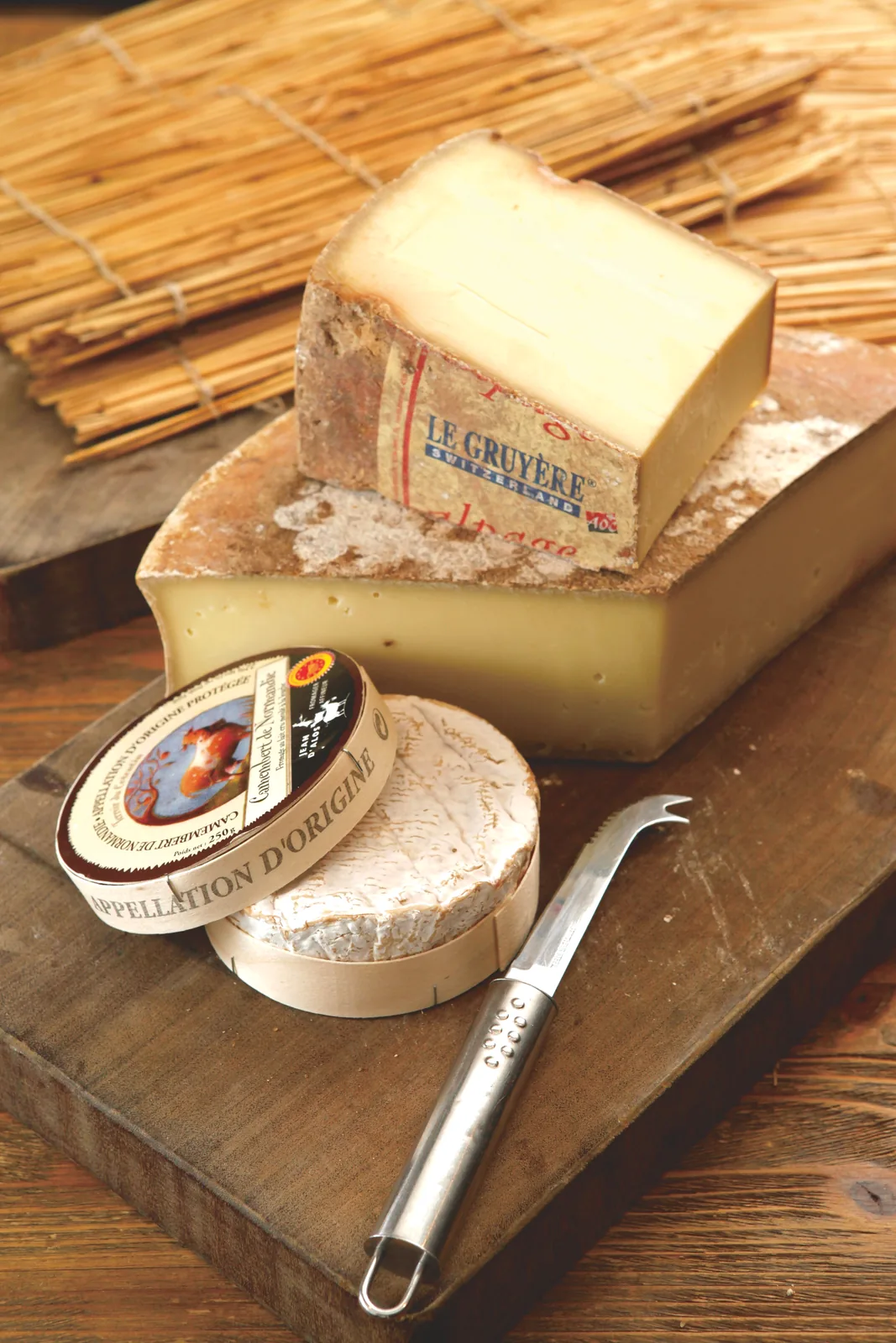 A selection of cheeses arranged on a tasting board
