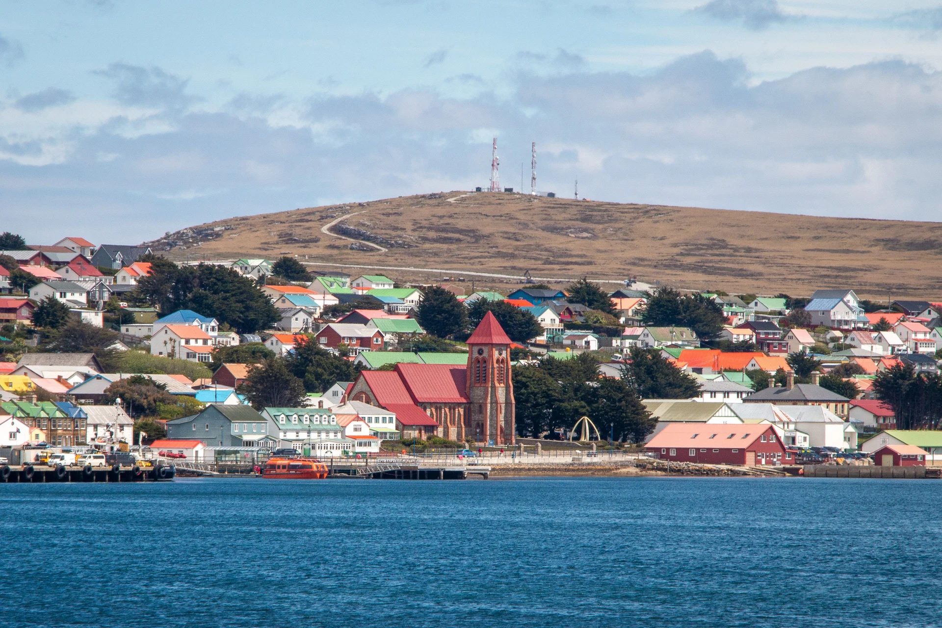 Stanley waterfront, Christ Church Cathedral, and colorful houses in the Falkland Islands