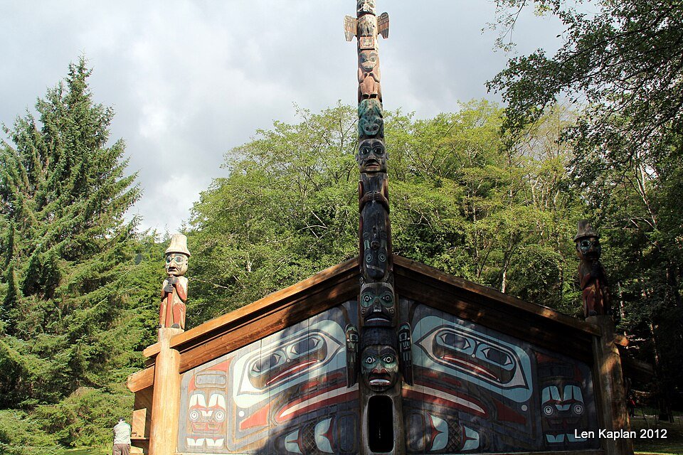 Carved poles and the clan house at Totem Bight State Historical Park