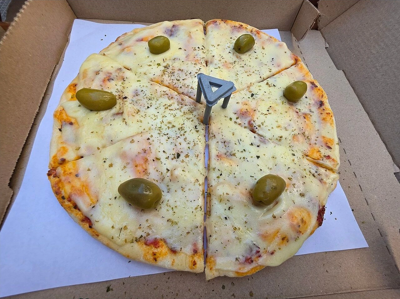 Pizza from Central Pizzas & Empanadas on Calle Lavalle in Buenos Aires