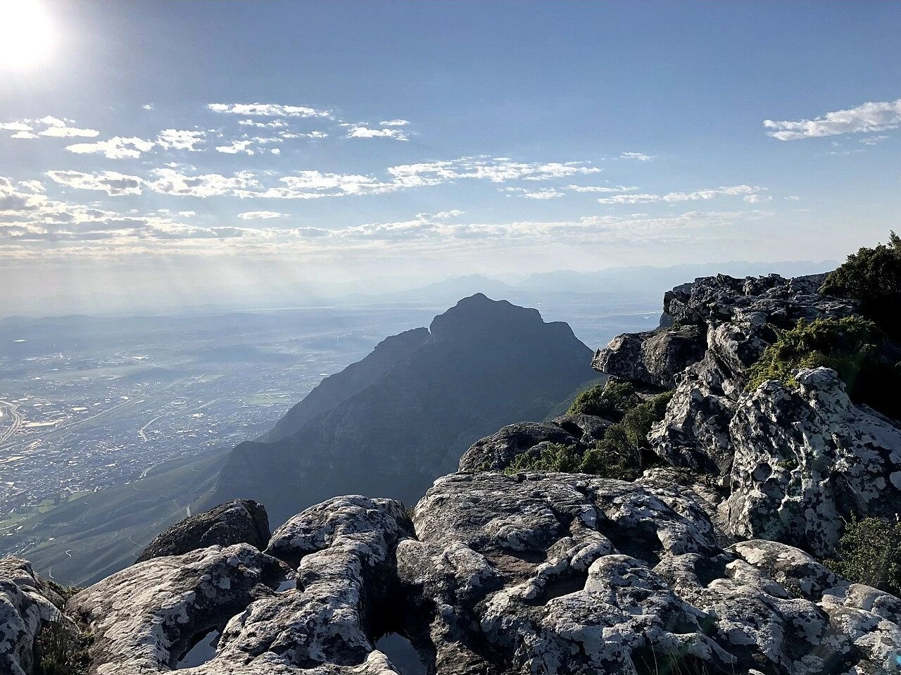 Rocky summit view from Table Mountain over Cape Town