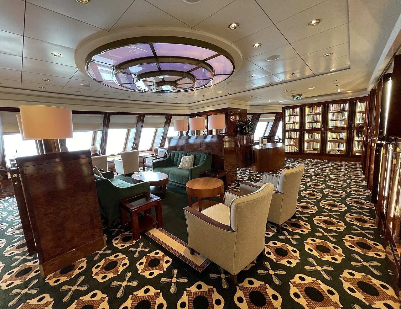 Reading chairs overlooking the bow in the Queen Mary 2 library