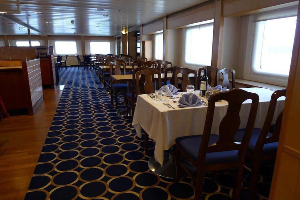 Dining room with large windows aboard MS Expedition, photographed in 2011